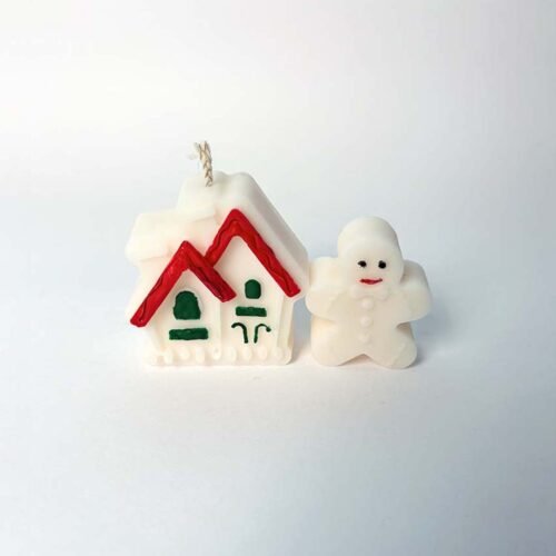 Christmas house and snowman candle